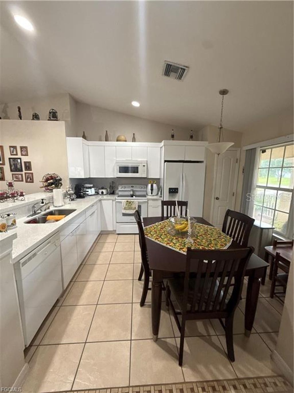 Photo of 1106 Summa Boulevard, Lehigh Acres, FL 33974 (MLS # A4678672)