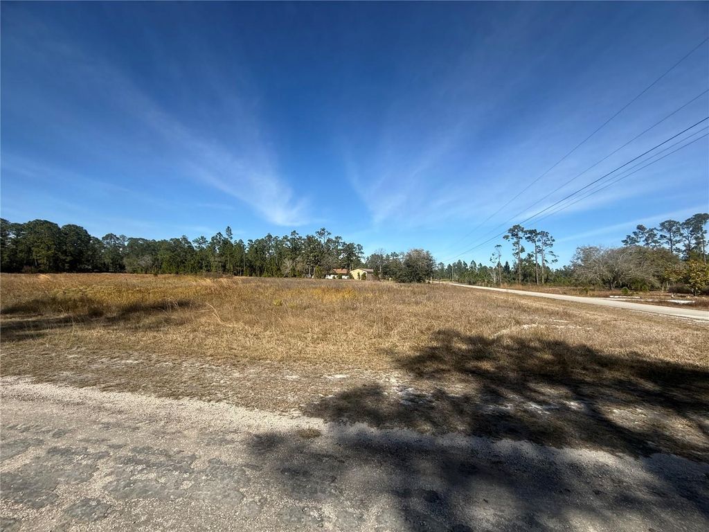 Photo of 397 Laguna Drive, Indian Lake Estates, FL 33855 (MLS # P4937623)