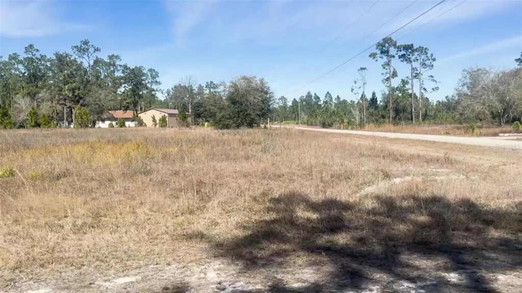 Photo of 397 Laguna Drive, Indian Lake Estates, FL 33855 (MLS # P4937623)