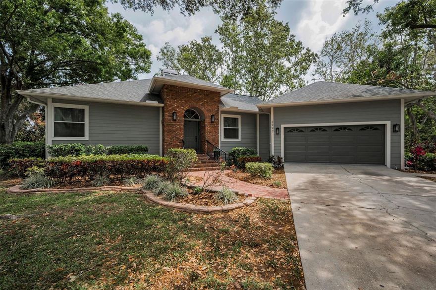 Contemporary Meets Traditional in this beautifully updated 4BR/2BA, 2Car Garage Executive Home + CONSERVATION PARCEL!
This home is located in Eagle Estates, one of the loveliest neighborhoods in all of Clearwater. Step inside and experience this lovely and spacious home! 
Interior features 2 fireplaces, functional open layout, and updated finishes throughout. Separate Living and Dining Rooms add formality and space for entertaining! Volume ceilings throughout. The Seller replaced original wood siding with New Hardi-Plank Cement Composite Siding with a lifetime warranty for worry-free living! Kitchen includes newer Stainless Steel Appliances. Major updated systems include NEW upgraded A/C 2024, Tankless Water Heater and Water Softener. Newer paint, new blinds. Completely renovated primary bath with dual sinks, designer soaking tub, spacious walk-in shower, linen closet, and separate water closet. Rare oversized, private and pristine home site surrounded by a lush conservation lot for total privacy, no rear or side neighbors, the county maintains the conservation lot. Open the French doors to the deck where you can relax and enjoy nature! No Flood Insurance, Non-Evacuation Zone, Great schools. Live within 10 minutes of Honeymoon Island's sandy white beaches! Close to several premier private and public Golf Courses, easy commute to TIA, Tampa and St. Peterburg.