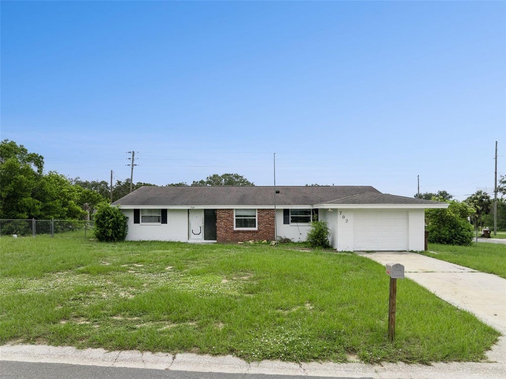 Photo of 702 Wildabon Avenue, Lake Wales, FL 33853 (MLS # O6431149)
