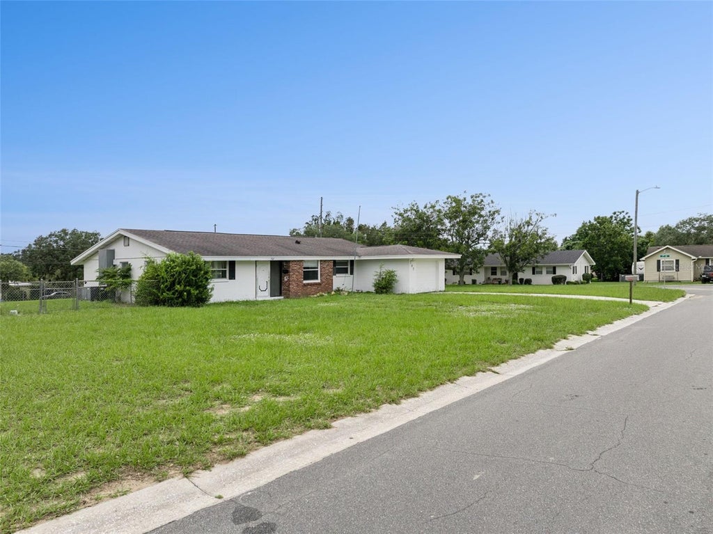 Photo of 702 Wildabon Avenue, Lake Wales, FL 33853 (MLS # O6431149)