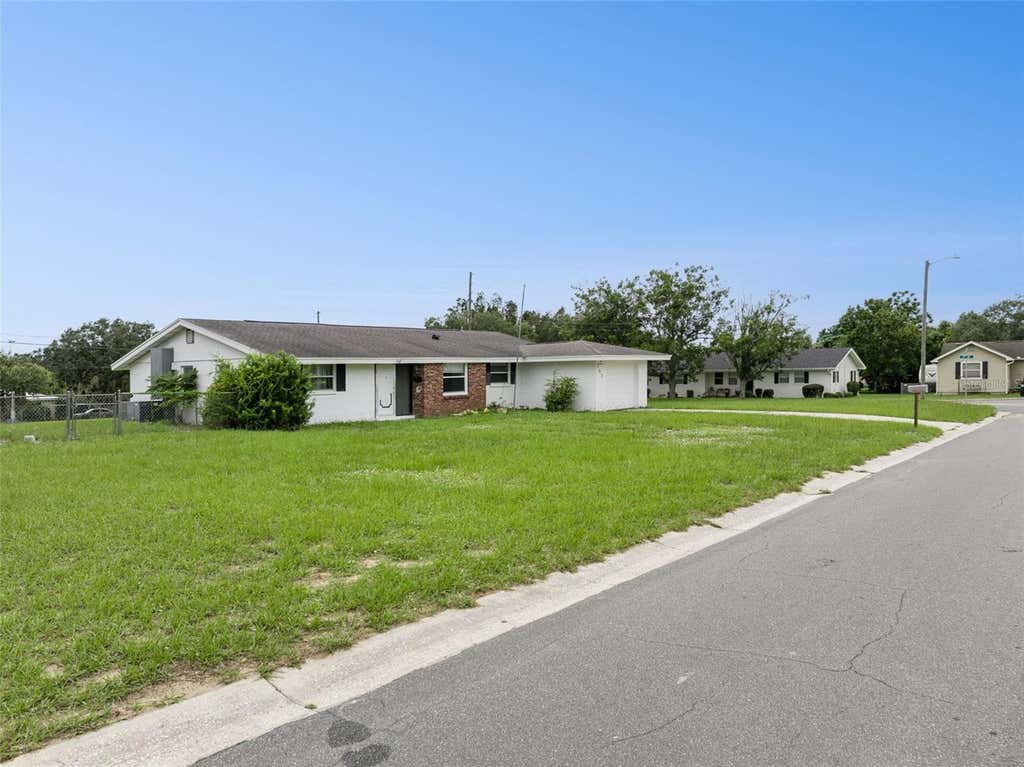 Photo of 702 Wildabon Avenue, Lake Wales, FL 33853 (MLS # O6431149)