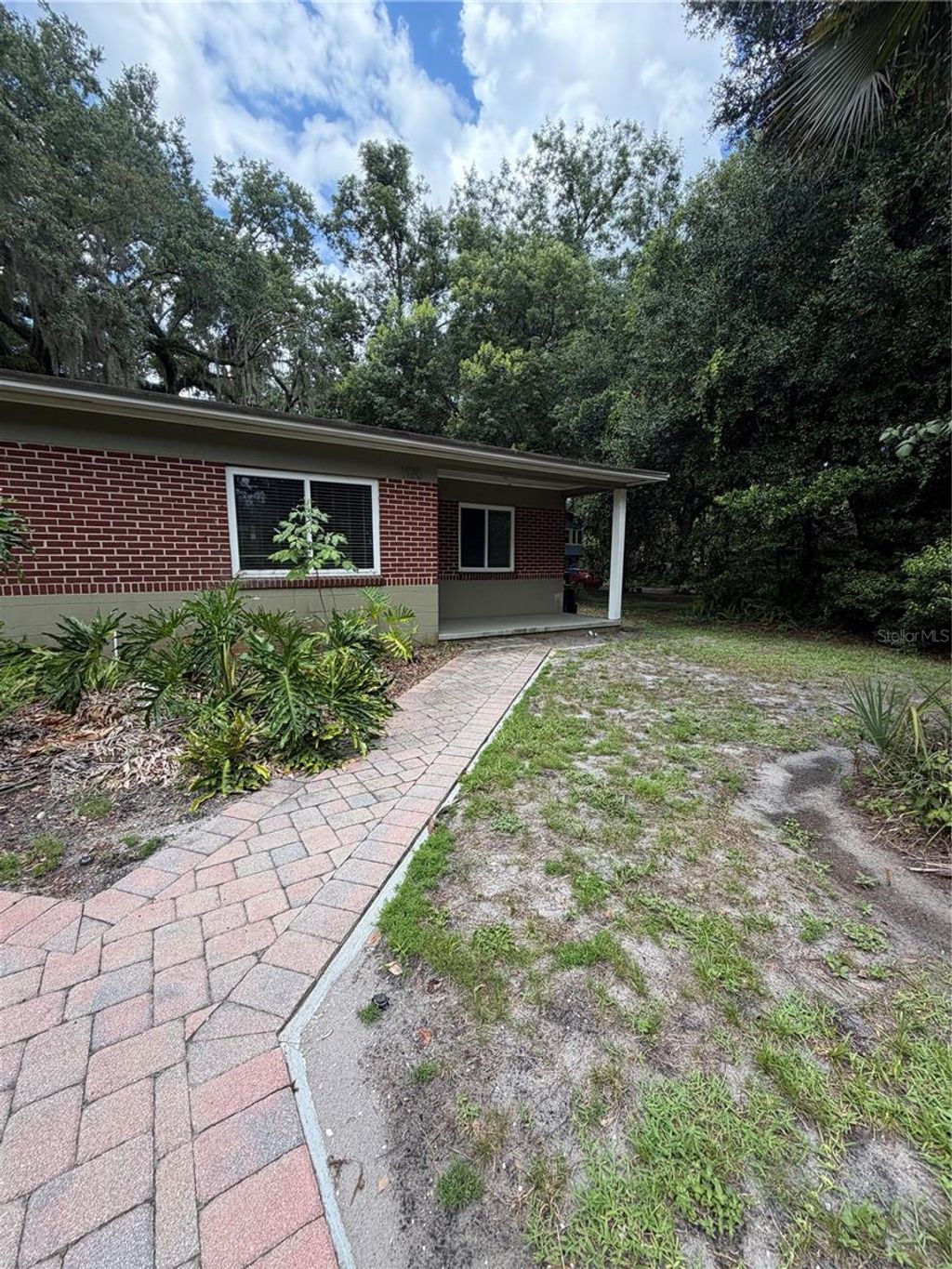 Photo of 1120 Palmer Street, Orlando, FL 32801 (MLS # O6421606)