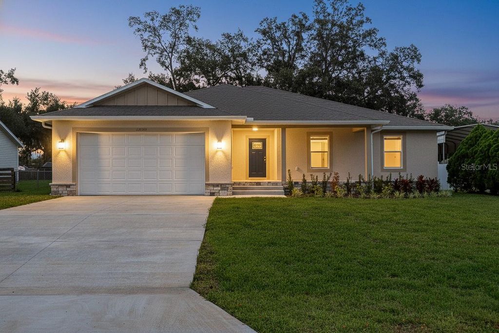 Photo of 12038 San Angela Drive, San Antonio, FL 33576 (MLS # TB8456243)