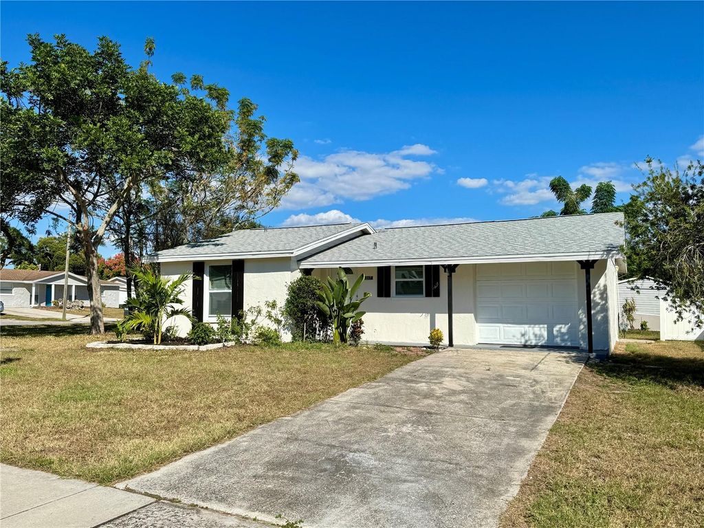 Photo of 1217 Grantwood Avenue, Clearwater, FL 33759 (MLS # TB8439712)