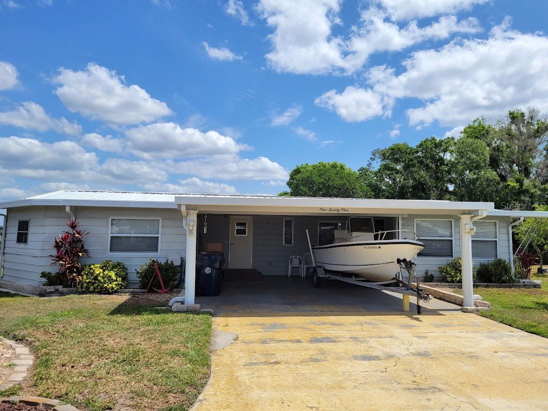Absolutely Stellar View of Lake Marianna from this 2 Bed/2Ba Manufactured Home w/ Your Own Private Inground Screened Pool. You will be talking about this view for weeks after viewing, guaranteed!!!! Mako Center Console Boat with Yamaha 115 4 stroke motor included. Priced at $209,900. Metal roof and fully furnished includes - Both Master Bedrm & 2nd Bedrm furnishings, Living rm furniture, dining rm furniture, Patio furniture, all kitchen cutlery/utensils. No lack of storage space here. New Pool Liner & screens in December 2024. You can enjoy the "Workshop/Man Cave" w/ window a/c that will allow you to tinker away. Separate Utility rm w/ washer & dryer. There's even a pool equipment room that has the pool pump & fixtures, all under roof in a separate rooms. Turnkey - Just bring your personal items and you're all ready to live on one of the finest lakes in Polk County. 1344 sq ft of living area. Living room has a view from a large window that will not be topped. Buyers must have Proof of Funds (Cash Deal) or Pre-Approval letter from Lender confirming they have enlisted the help of a Lender & are qualified prior to showing. Call for an appointment to view this home today!!!