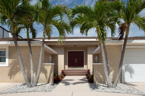 Photo of 2504 Hibiscus Drive W, Belleair Beach, FL 33786 (MLS # O6416622)