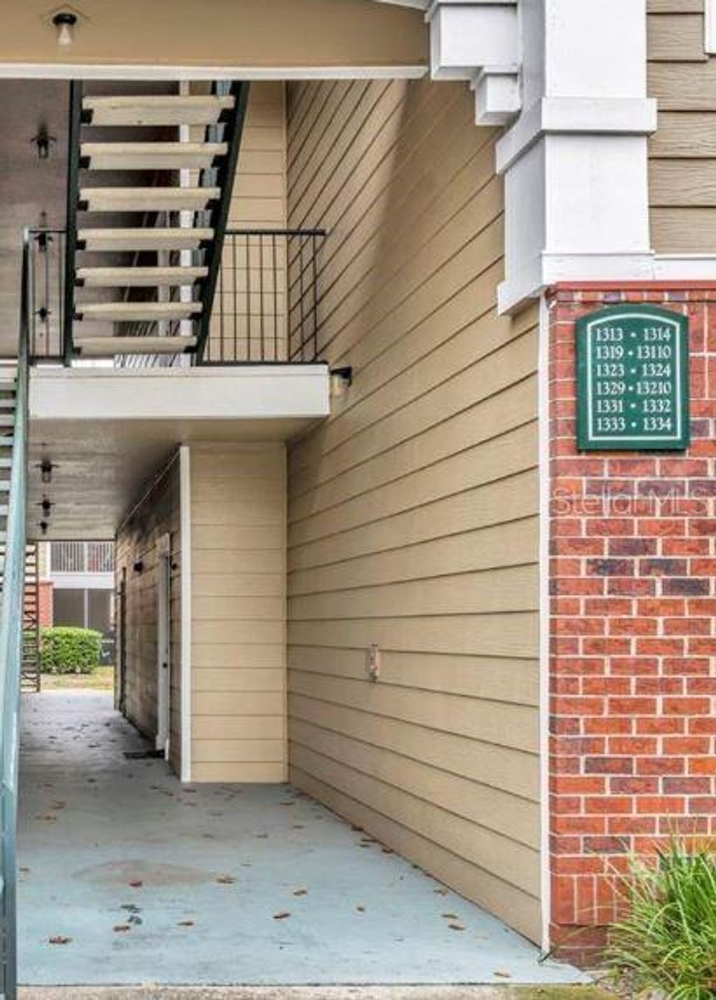 Photo of 13003 Plantation Park Circle #1319, Orlando, FL 32821 (MLS # S5142751)