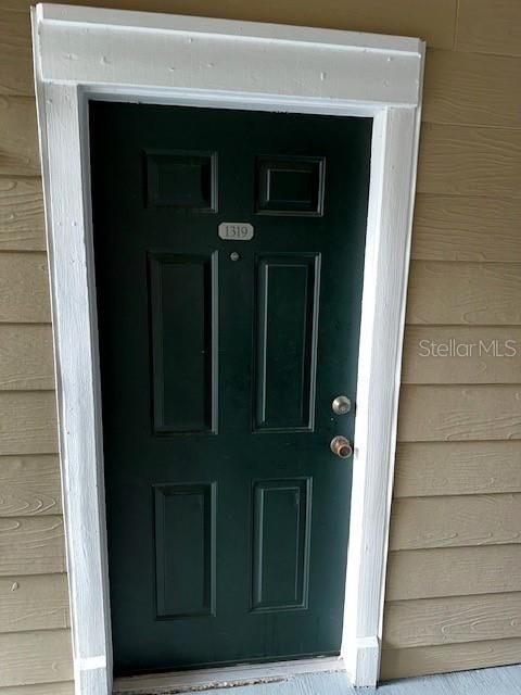 Photo of 13003 Plantation Park Circle #1319, Orlando, FL 32821 (MLS # S5142751)