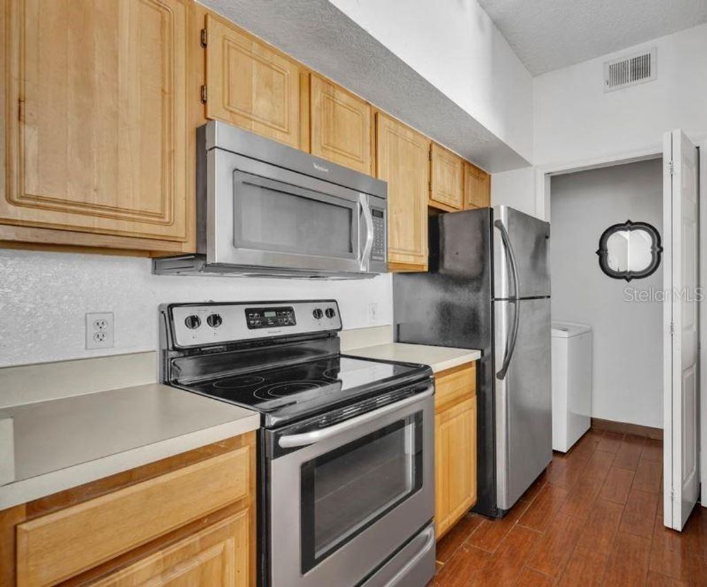 Photo of 13003 Plantation Park Circle #1319, Orlando, FL 32821 (MLS # S5142751)