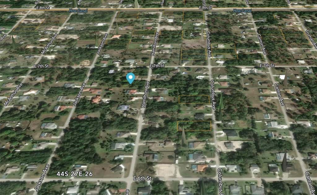 Photo of 619 Hamilton Avenue, Lehigh Acres, FL 33972 (MLS # GC542641)