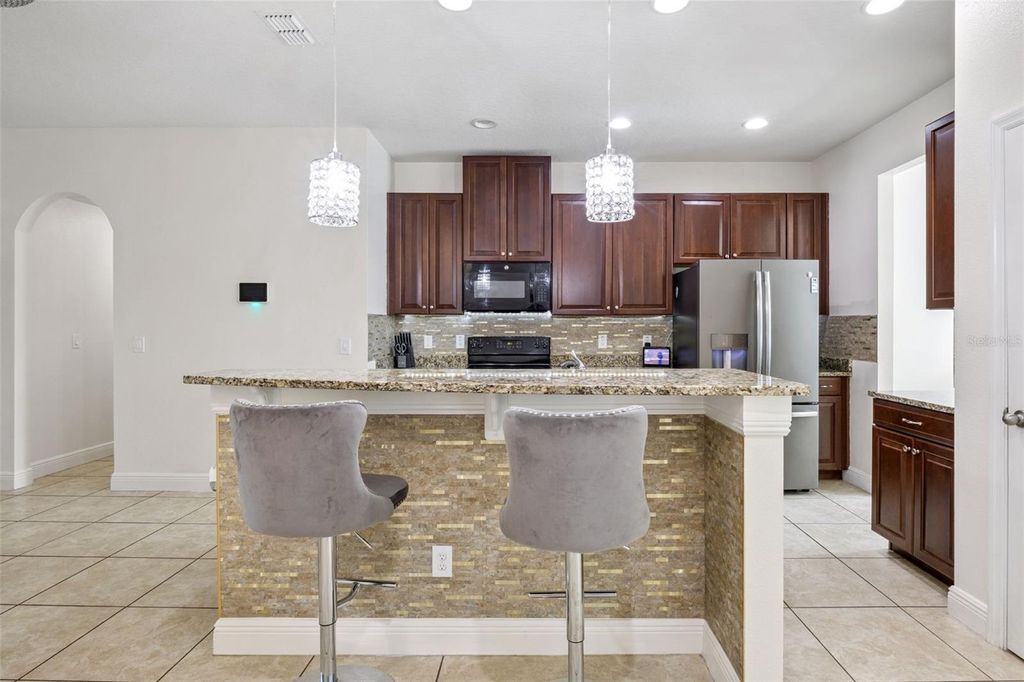 Photo of 1913 Sanderlin Point Loop, Apopka, FL 32703 (MLS # O6351187)