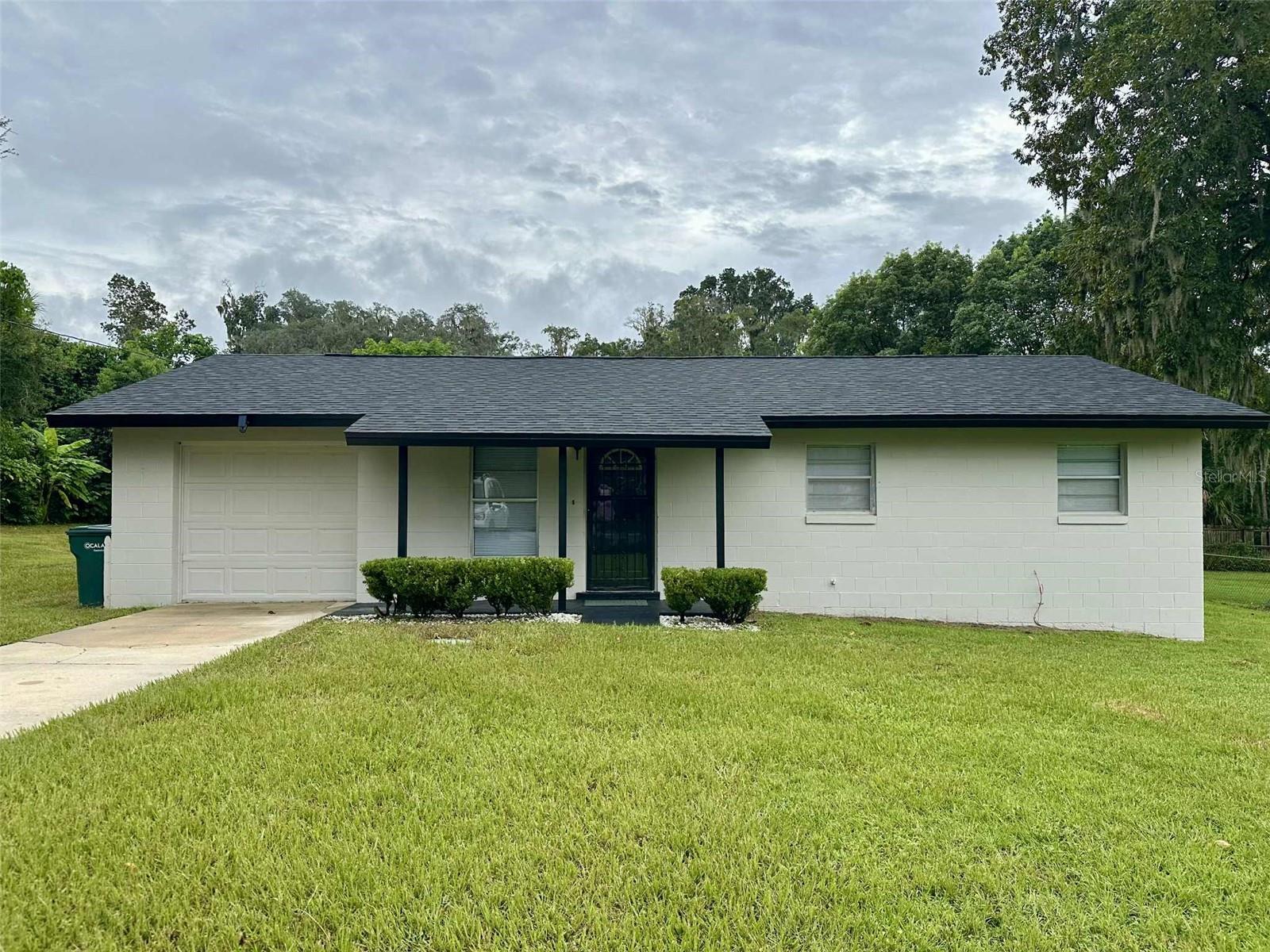 This cute 3 bedroom 2 bath is move in ready in Ocala Highlands. This home has tons of potential for expanding and a great starter home! Large screened in porch with so much space. 1 car garage with storage. Seller is willing to do owner financing.