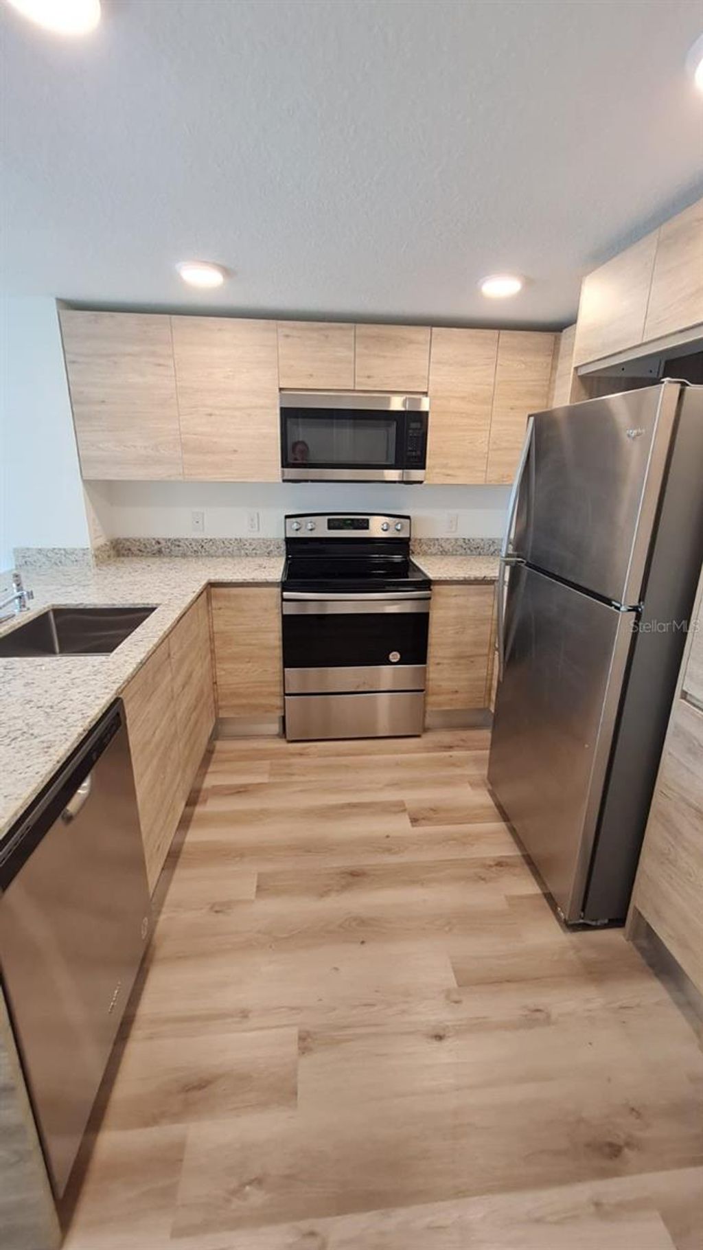 Photo of 1230 Southstation Place #312, Orlando, FL 32809 (MLS # O6381128)