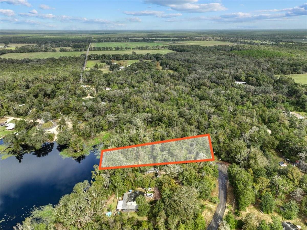 LAKE IN THE WOODS - Land