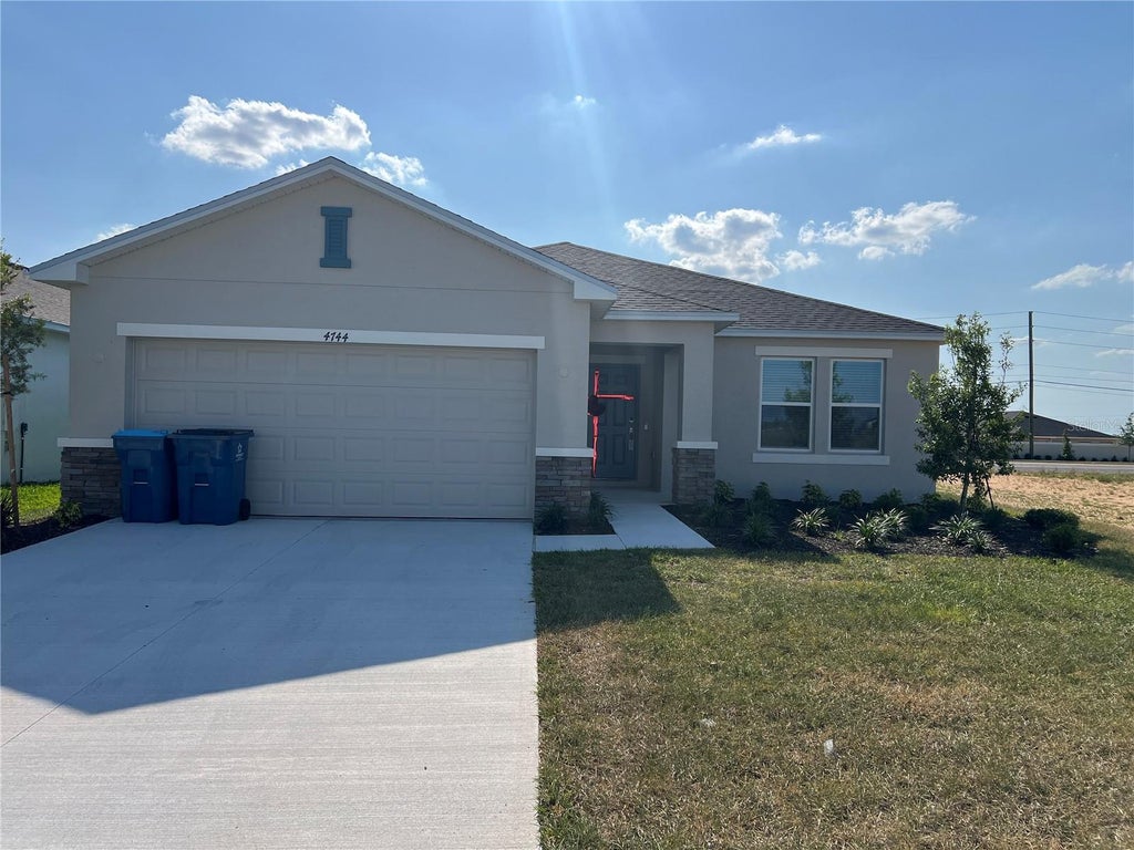 Photo of 4744 Babys Breath Place, Haines City, FL 33844 (MLS # O6439876)