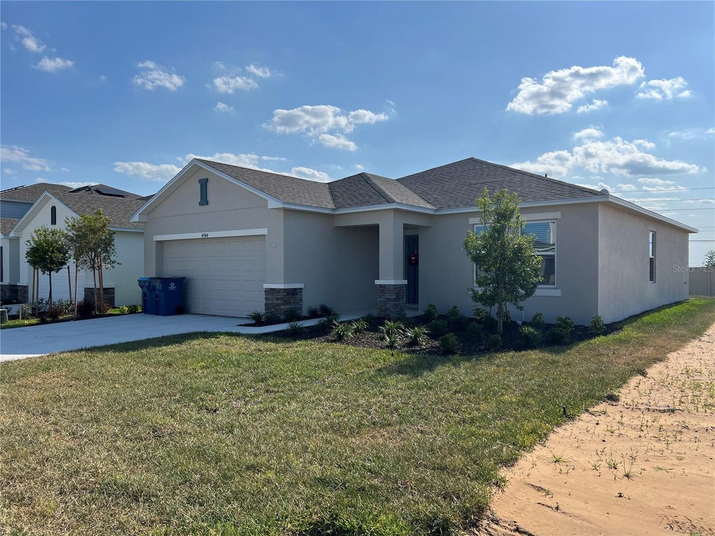 Photo of 4744 Babys Breath Place, Haines City, FL 33844 (MLS # O6439876)