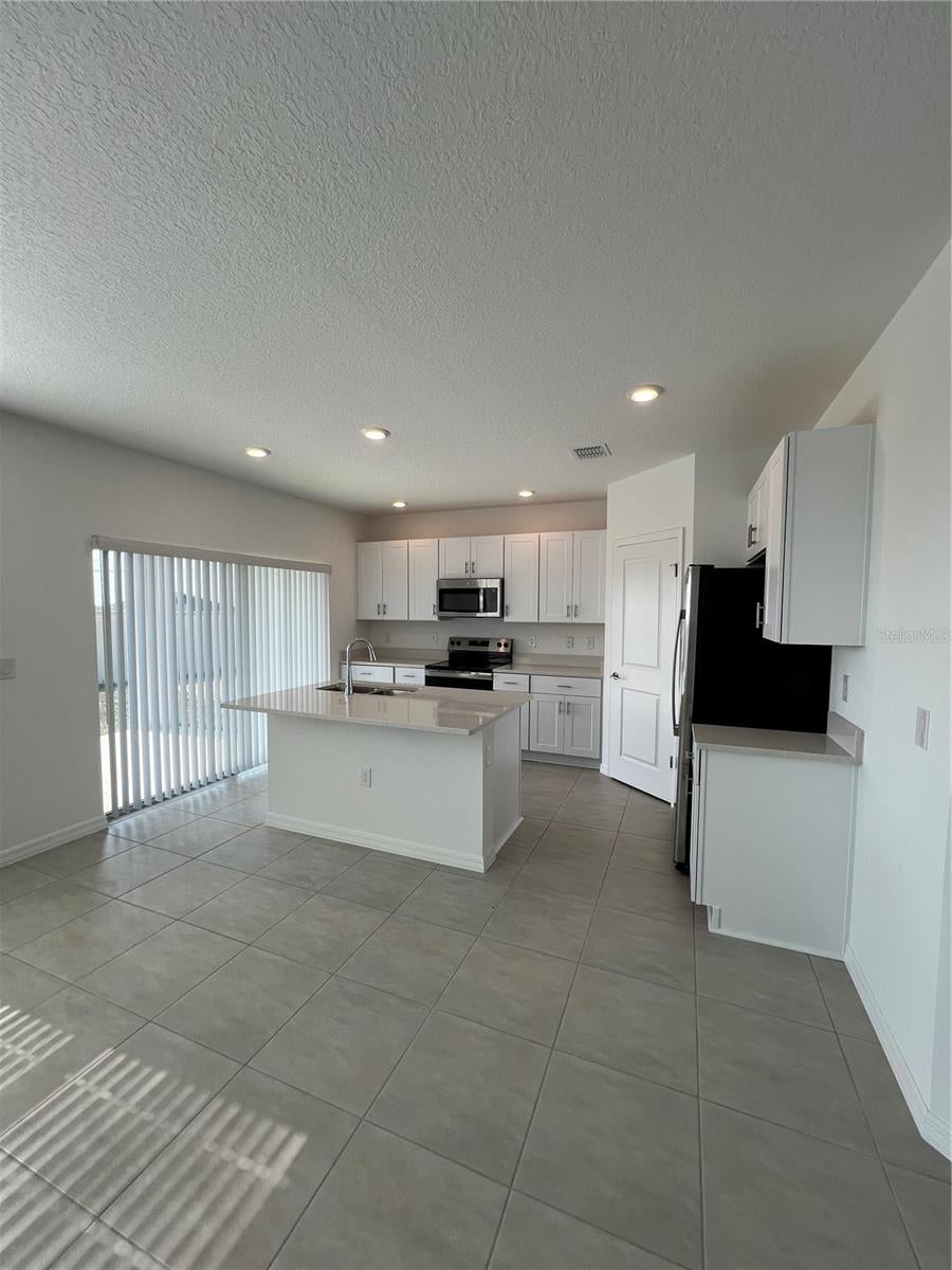 Photo of 4744 Babys Breath Place, Haines City, FL 33844 (MLS # O6439876)