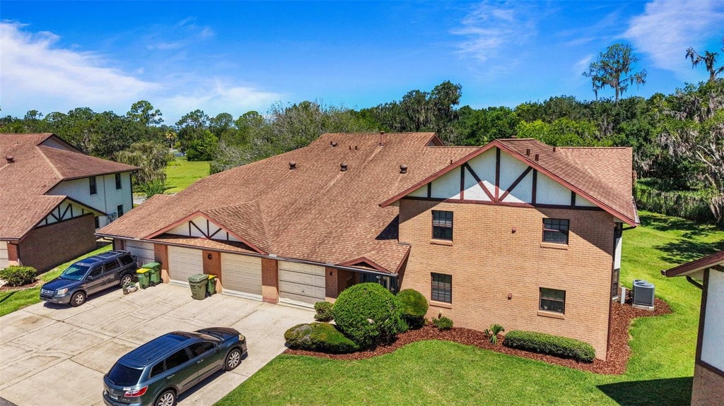 Photo of 100 E Oak Terrace Drive #C1, Leesburg, FL 34748 (MLS # O6414506)