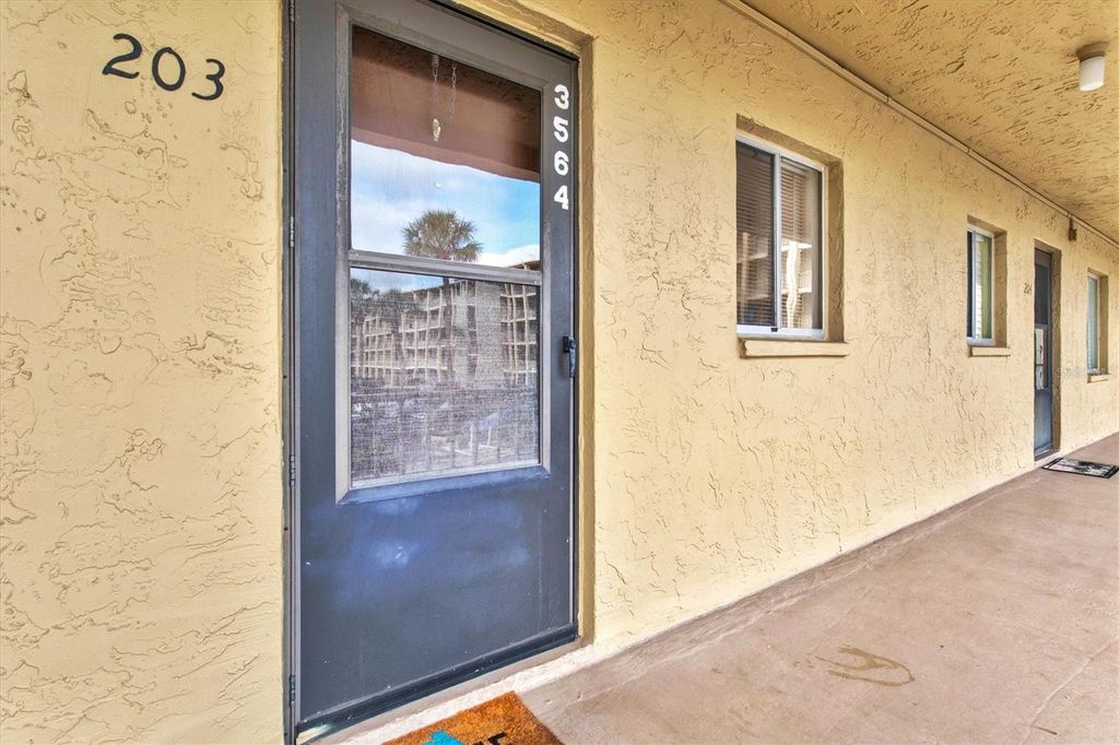 Photo of 3564 Lake Bayshore Drive #203, Bradenton, FL 34205 (MLS # A4673772)