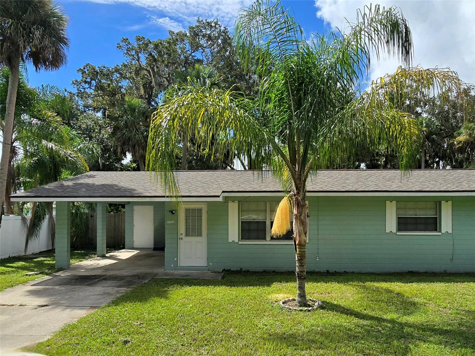 Renovated Duplex Living Just One Block from the Indian River!
Discover the perfect blend of location and style at 110 Mariann Lane, Unit A — a beautifully updated 2-bedroom, 1-bath duplex just steps from the scenic Indian River in the heart of Edgewater. Inside, you’ll find a light-filled, open layout with sleek tile flooring throughout, making it both stylish and low-maintenance. The modern kitchen features granite countertops, stainless steel appliances, and 42-inch cabinets, creating a space that’s as functional as it is beautiful.
The remodeled bathroom adds a fresh, contemporary feel, while generous closet space ensures you have room for everything. Step outside to the fenced backyard, shared with Unit B, offering a comfortable setting for relaxing or entertaining. Small pets are preferred to maintain a peaceful shared space.
This prime location puts you within walking distance of the water and two popular parks — Menard-May Park, just 0.3 miles away, with its fishing pier and canoe launch, and George R. Kennedy Memorial Park, only 0.6 miles away, offering a public boat ramp and additional fishing piers. Dining, shopping, and local favorites are all close by, with New Smyrna Beach just a short drive away.
Additional features include parking for two vehicles (one in the carport and one directly behind it) plus space for a small boat or jet skis. Tenants are responsible for all utilities and lawn care, and renters insurance is required. Washer and dryer hookups are ready for your own units. Up to two pets are allowed with a non-refundable fee of $250 for the first and $150 for the second, with small pets preferred due to the shared yard.
Whether it’s launching your kayak at sunrise, strolling along the Indian River in the evening, or exploring nearby waterfront dining, this home offers an unbeatable Florida lifestyle in a highly desirable location. Schedule your private showing today — this one won’t last long.