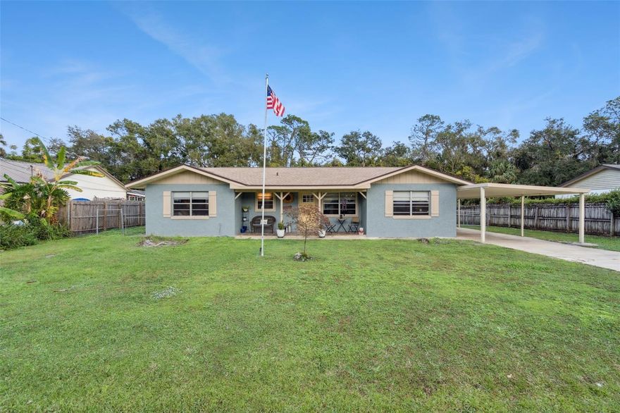 Welcome to this Lake Beresford Terrace pool home, set on a spacious .36-acre lot. This 3-bedroom, 2-bathroom home features a screened oversized pool, sunroom, and covered lanai, creating ideal spaces for relaxation and entertaining. Major updates include a NEW roof (2024), NEW HVAC (2024), and NEW front door and sliding doors (2024). No HOA! The kitchen has been updated with cherry wood cabinets and granite counters. Updated tile floors throughout most of the home. Two of the bedrooms have NEW Carpet. The home also boasts fresh exterior paint. Hobbyists and those in need of additional storage will love the 700 sq ft detached garage/workshop as well as the carport. Lake Beresford homeowners enjoy deeded access to Lake Beresford. Conveniently located just a few minutes from the DeLand Sunrail Station, a few miles from historic downtown DeLand for shopping and dining and close to the beach and major transportation. *This home has potential to convert one of the rooms to a 4th bedroom if needed*
