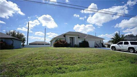 Photo of 110 NW 24th Terrace, Cape Coral, FL 33993 (MLS # O6360045)
