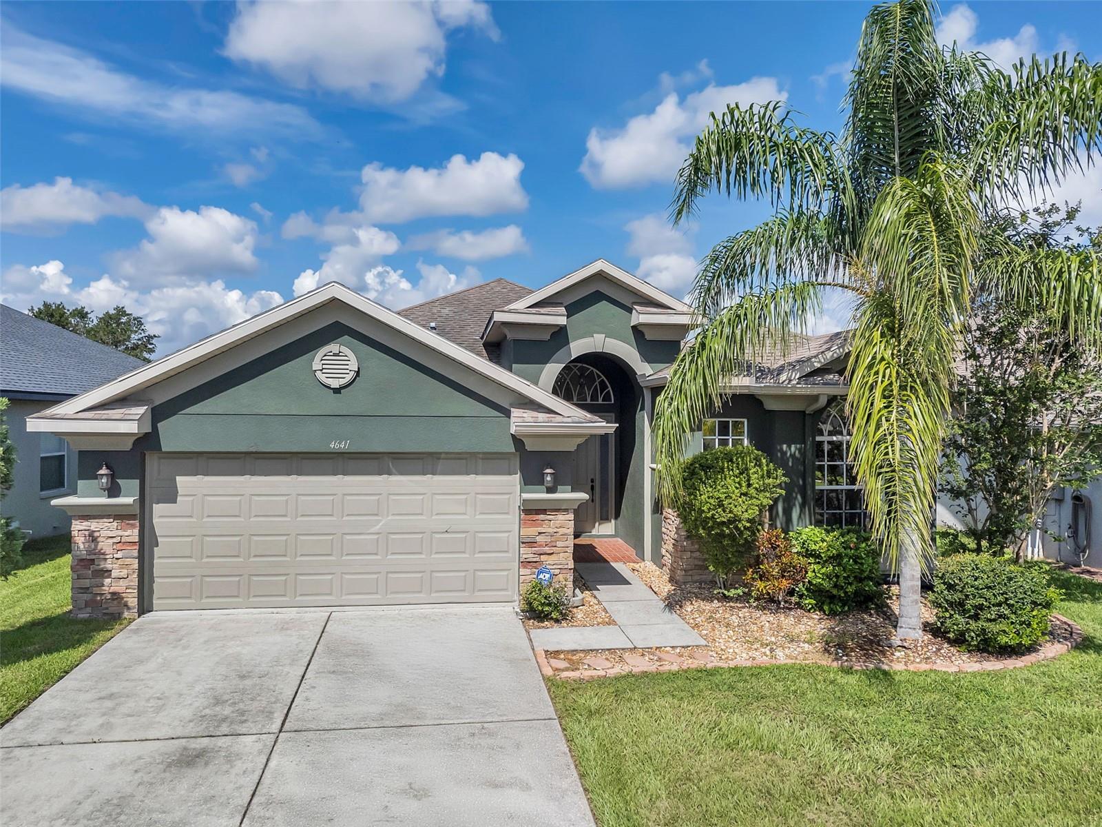Discover comfort, space, and lifestyle in this beautifully maintained pool home, perfectly situated in the sought-after Country Walk community of Wesley Chapel.
This 3-bedroom, 2-bath pool home offers nearly 2,000 sq ft of open-concept living in a top-rated, amenity-rich community. The interior features a striking kitchen with 42? maple cabinets, granite countertops, ceramic tile backsplash, stainless steel appliances, and a cozy eat-in café. New wood-look laminate flooring runs throughout, with ceramic tile in all wet areas. The spacious primary suite includes dual walk-in closets, dual vanities, a walk-in shower, and a garden tub. Upgrades include a Pelican no-salt whole-house water softener, whole-home surge protection, professionally tinted windows, and a CAT-4 resistant garage door with LiftMaster opener. The fully fenced backyard features a beautifully landscaped yard, a crystal-blue inground pool (re-tiled in 2019, pump replaced in 2021), and a covered patio overlooking open greenspace for added privacy.
Comfort and efficiency are built in with a full A/C system replacement in 2022, along with energy-saving upgrades throughout. Country Walk offers resort-style living with two pools, a clubhouse with kitchen, fitness center, tennis and basketball courts, a soccer field, playground, dog park, and scenic walking paths. The community is zoned for top-rated schools and is close to multiple charter options. Enjoy easy access to I-75 and I-275, and just minutes to Tampa Premium Outlets, Wiregrass Mall, The Grove, KRATE Park, hospitals, restaurants, and entertainment. Don’t miss this exceptional Country Walk pool home—schedule your showing today!
