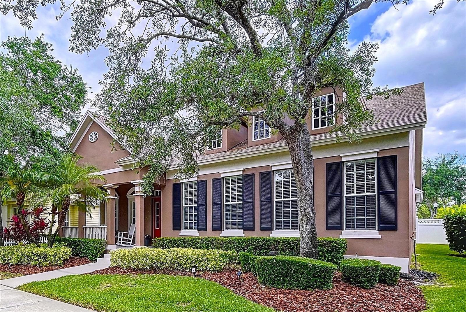 Welcome to Village Green at The Greens of Westchase, one of most exquisite neighborhoods in Westchase. Village Green is a 24-hour guarded and gated enclave nestled within one of Tampa Bay’s most sought-after communities. This beautifully appointed residence offers the perfect blend of timeless character and modern comfort, featuring up to 3,095 square feet of thoughtfully designed living space, including five bedrooms, three full baths, and a versatile bonus room ideal for guests, a private office, or a sixth bedroom. Set in an intimate neighborhood celebrated for its charming front porches, picturesque streetscapes, all separated by clean, crisp alley ways and mature tree lined/canopy streets. This home invites you to enjoy a lifestyle rich in amenities and community spirit. Stroll to nearby tennis courts, resort-style pools, scenic nature trails, boutique shops, and inviting cafés, all within the nationally recognized Westchase community. Inside, you’re welcomed by a bright and open floor plan that flows seamlessly from room to room. While some dated and well lived finishes await your personal touch, the home has been lovingly maintained and priced accordingly that offers a wonderful opportunity to update and create your dream space to your specific preferences. The home is priced to accommodate updating and sold as-is to allow the new owners to bring their own vision to life. The expansive first-floor primary suite features dual closets and a spa-inspired ensuite with a soaking tub and separate shower. Upstairs and downstairs, generously sized bedrooms provide comfort and privacy for family and guests alike. New HVAC systems and a spacious bonus room just off the family room offers endless possibilities: home office, playroom, guest suite, or media retreat. Step outside to a tranquil screened lanai with splash pool and a spacious fenced backyard—perfect for entertaining, relaxing, or playing under the Florida sun. The yard is complete with multi-zone irrigation to keep everything lush year-round. Additional highlights include a new roof (2019), dual HVAC systems (with the downstairs unit replaced in 2017), and updated pool equipment (2022)—offering peace of mind and long-term value. Living in Westchase means enjoying an exceptional array of amenities: two resort-style pools, ten lighted tennis and pickleball courts, basketball and soccer fields, splash parks, playgrounds, fitness trails, and year-round community events. A short walk across the pedestrian bridge leads you to the lively heart of West Park Village, filled with dining, shopping, and social charm. With top-rated schools nearby and easy access to Downtown Tampa, St. Petersburg, Tampa International Airport, and award-winning Gulf beaches, this home offers both convenience and elegance. Priced below the comparable market value for this intimate enclave of 90 extraordinary homes, this is a rare opportunity to own a home in one of Tampa Bay’s most envied and coveted neighborhoods. Schedule your private showing today and experience the luxury, comfort, and community of Village Green at Westchase.
