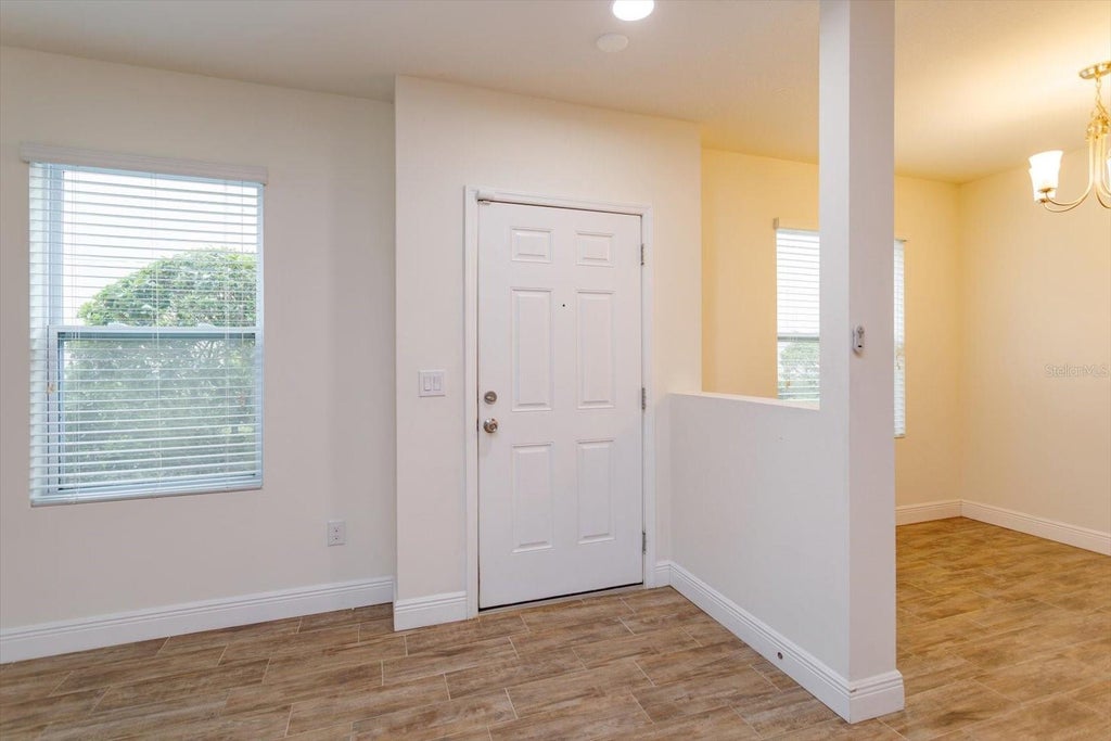 Photo of 3641 Seneca Club Loop #4-103, Orlando, FL 32808 (MLS # O6435487)