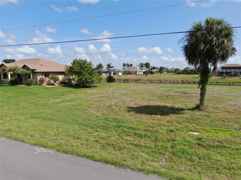 Photo of 35 Tournament Road, Rotonda West, FL 33947 (MLS # D6146938)