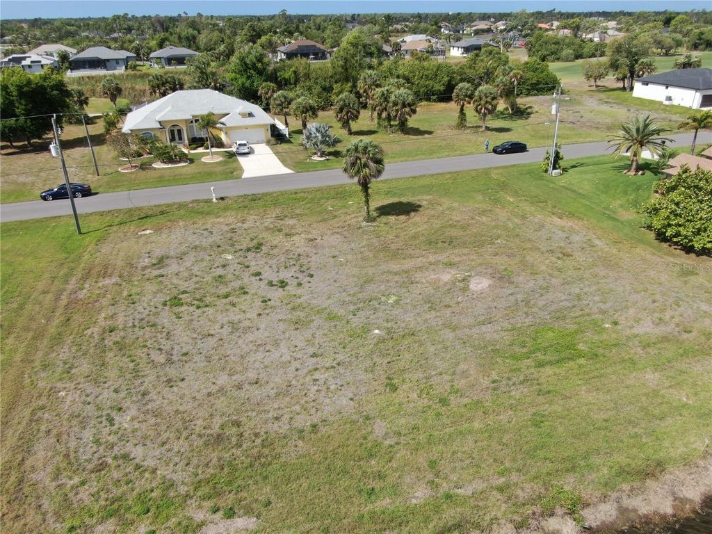 Photo of 35 Tournament Road, Rotonda West, FL 33947 (MLS # D6146938)