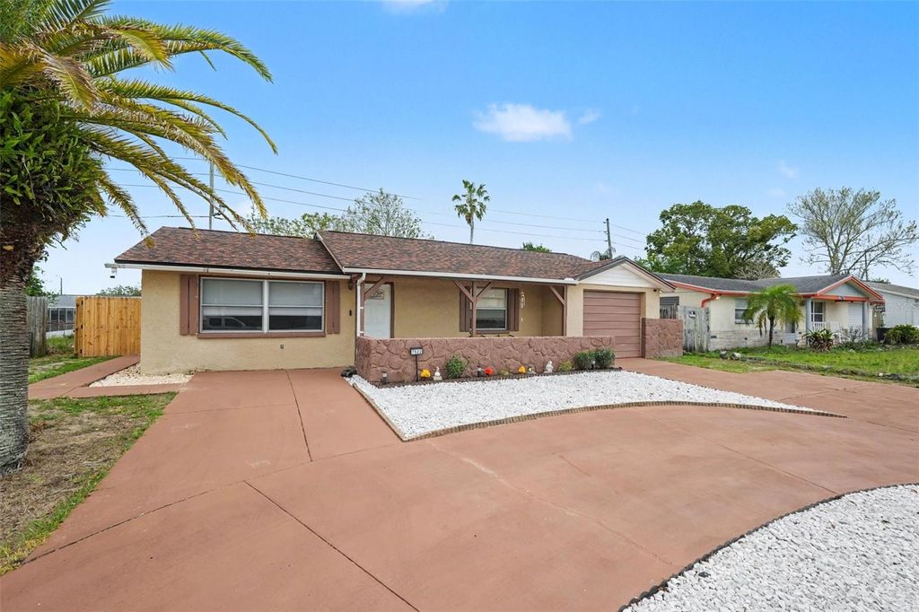 Photo of 7522 Topay Lane, Port Richey, FL 34668 (MLS # TB8486878)