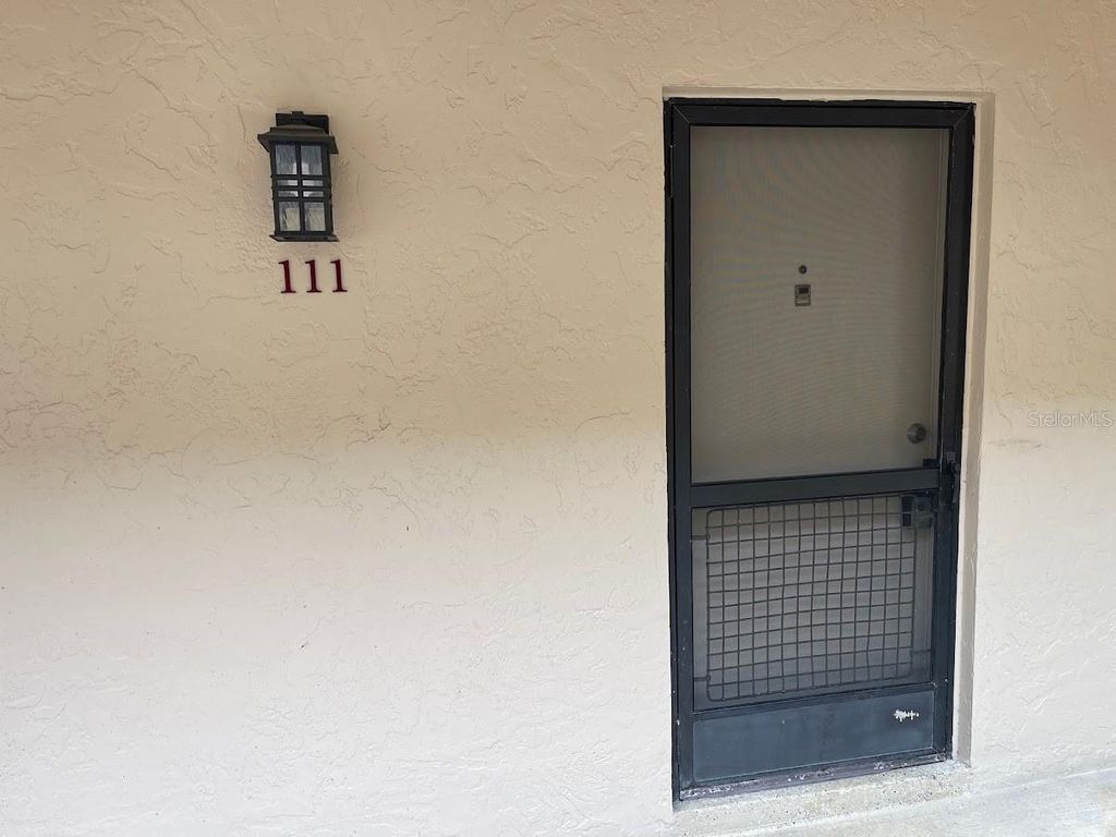 Photo of 2763 Woodgate Lane #111, Sarasota, FL 34231 (MLS # A4680629)