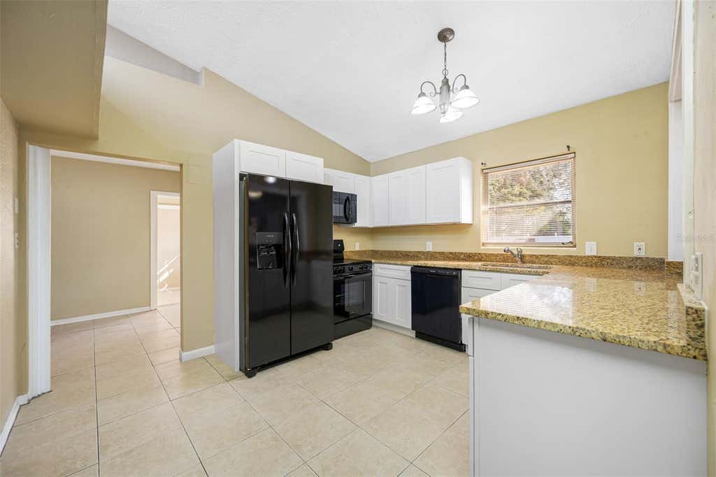 Photo of 306 Crystal Beach Avenue, Crystal Beach, FL 34681 (MLS # TB8527031)
