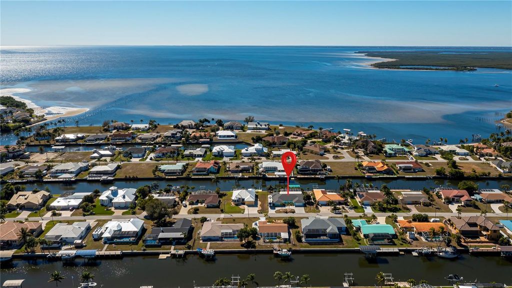 Photo of 121 Sinclair Street SE, Port Charlotte, FL 33952 (MLS # C7522272)