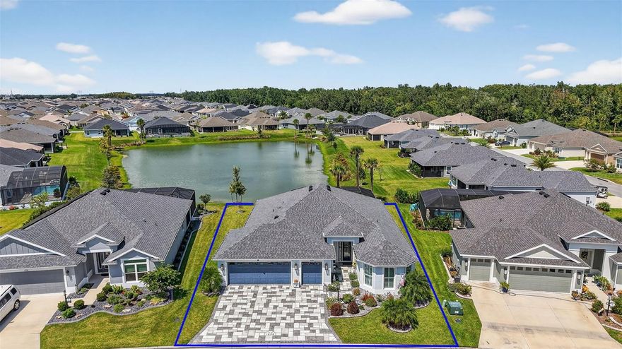 ENJOY SPECTACULAR WATERFRONT VIEWS in this ABSOLUTELY STUNNING 3/2 EXPANDED BEGONIA with CUSTOM SWIMMING POOL, PAVER DECK, 330sf CLIMATE-CONTROLLED ENCLOSED COVERED LANAI, and OVERSIZED 667sf TWO CAR + GOLF CART GARAGE in the CONTEMPORARY Village of Newell! JUST MINUTES from Sawgrass Grove; Franklin, Homestead, and Ezell Pool and Recreation Centers; and Southern Oaks Championship Course! STONED planting beds with CURBED edges, DECORATIVE STAMP driveway, and a beautiful FROSTED GLASS door with transom, side-lite, and RETRACTABLE SCREEN welcome you into the foyer of this MAGNIFICENT home! Built in 2023, this nearly NEW home offers LOW-MAINTENANCE peace of mind with MODERN DESIGN and boasts an ABUNDANCE of UPGRADES including PLANTATION SHUTTERS, LUXURY VINYL PLANK FLOORING throughout, HIGH BASEBOARDS, and Nova WATER FILTRATION and FULL HOUSE SURGE PROTECTION! The main living area features an EXPANSIVE OPEN LAYOUT with SOARING VAULTED ceilings adorned with CROWN MOLDING. From these rooms, sliding glass doors with a CUSTOM CORNICE lead you into the 30’x11’ CLIMATE-CONTROLLED ENCLOSED LANAI! This FANTASTIC room adds 330sf of living area and features a MINI-SPLIT and four sets of FULL-PANEL, TINTED sliding glass doors that open to the INCREDIBLE OUTDOOR OASIS of the POOL and SPA area! The HEATED POOL boasts a WATERFALL and a HIDDEN, IN-GROUND SOLAR COVER! If you’ve been dreaming of RESORT-STYLE LIVING AT HOME—THIS IS IT! Dive into the refreshing POOL, soak up the sun on the deck, or simply enjoy the PEACEFUL WATERFRONT VIEWS! Back inside, the AMAZING kitchen showcases STAGGERED EBONY cabinetry with PULL-OUTS, QUARTZ countertops, built-in PANTRY, STAINLESS appliances, herringbone TILE backsplash, GAS cooking, COUNTER-HEIGHT EAT-IN counter, and an ADJACENT DINETTE. The luxurious primary bedroom boasts a TRAY ceiling and TWO LARGE CUSTOMIZED WALK-IN closets. Its en-suite bathroom features JACK & JILL vanities, QUARTZ counters, TILED WALK-IN ROMAN shower, BUILT-IN LINEN closet, and separate water closet. The SPLIT floor plan offers two additional bedrooms and second bathroom, conveniently hidden behind a POCKET door near the front of the home, creating a PRIVATE GUEST WING and/or QUIET home office. Bedroom two boasts a walk in BAY window, TRAY ceiling, and built-in closet. A third bedroom features VAULTED ceiling, DOUBLE windows, and built-in closet. The second bathroom offers a SPACIOUS blue vanity with QUARTZ countertop, TILED WALK-IN shower, and a hallway LINEN closet. A centrally located INTERIOR laundry room features EBONY cabinetry, shelving, and a utility sink. Completing the package is an OVERSIZED 31’x25’ TWO CAR + GOLF CART GARAGE with MOTORIZED garage SCREEN, attic insulation and exhaust fan, insulated garage doors, and attic access stairs. DON'T MISS YOUR OPPORTUNITY TO MAKE THIS EXCEPTIONAL WATERFRONT POOL HOME YOUR OWN! The Village of Newell is close to Sawgrass Grove, Brownwood Paddock Square, and the new upcoming Eastport Square; six neighborhood pools and recreation centers (Franklin, St. Catherine, Bradford, Aviary, Hawkins, Homestead); three large regional recreation complexes (Ezell, Everglades, and Rohan); Southern Oaks Country Club and Championship Golf Course; Clifton Cove Putting Course; Mickylee Pitch and Putt; shopping and dining at Magnolia Plaza; Homestead dog park for your furry friends and more! PLEASE WATCH OUR WALKTHROUGH VIDEO OF THIS EXCEPTIONAL HOME and call today to schedule your Private Showing or Virtual Tour!