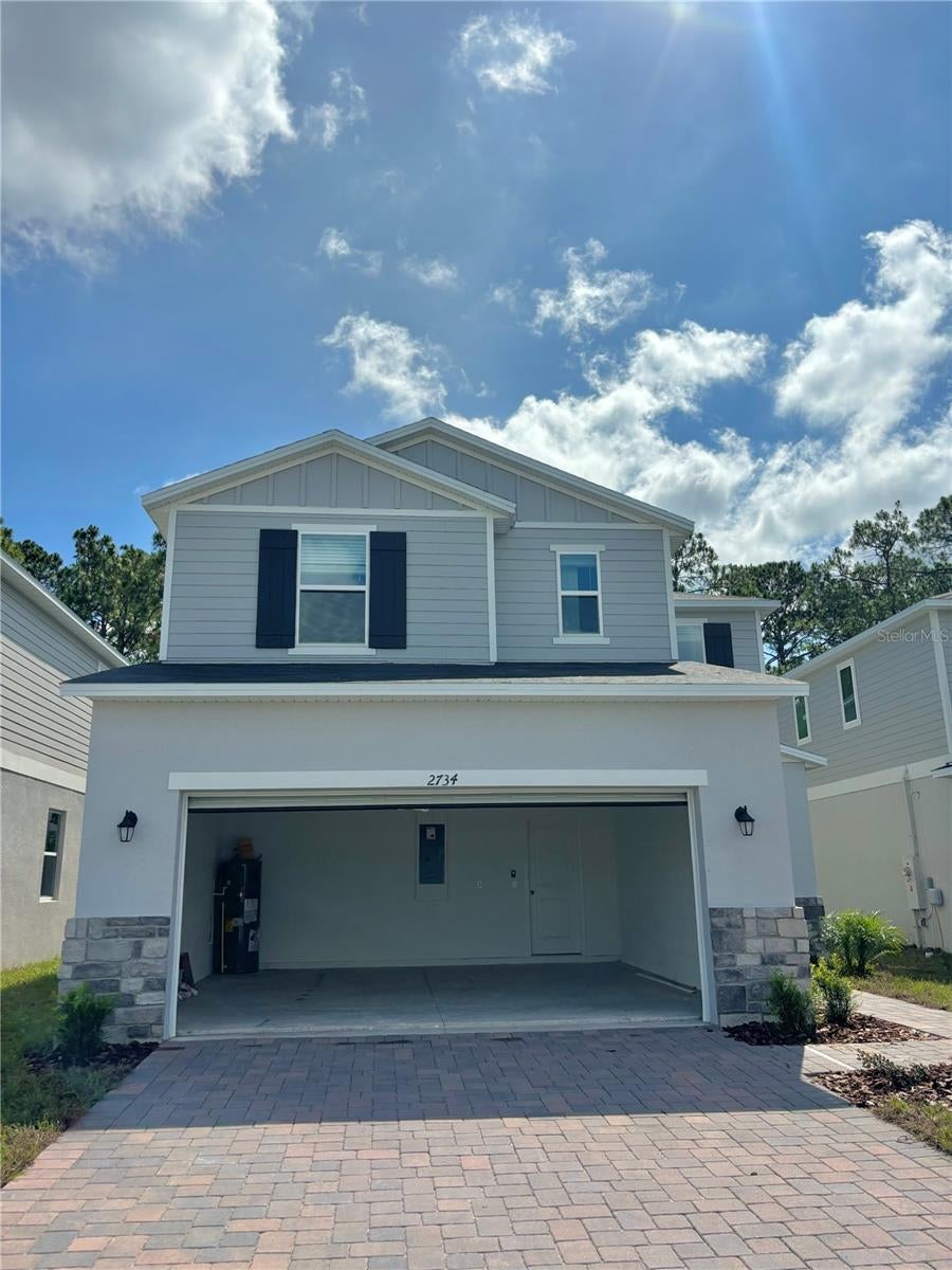Photo of 2734 Raindrop Run St, Clermont, FL 34714 (MLS # O6425309)