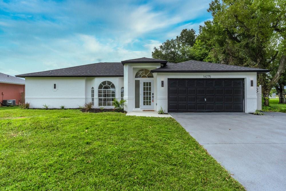 Welcome to 16275 Horizon Rd, North Fort Myers — a stunning, fully remodeled home nestled in one of the area’s most desirable neighborhoods. Featuring 3 bedrooms, 2 bathrooms, and over 1,600 square feet of beautifully updated living space, this property perfectly blends modern design, functionality, and true Florida comfort.
Step inside to find a bright open layout with luxury tile flooring, designer lighting, and modern finishes throughout. The custom kitchen showcases quartz countertops, stainless steel appliances, soft-close cabinetry, and sleek fixtures, while both bathrooms boast floor-to-ceiling tile, frameless glass showers, and contemporary vanities. Enjoy your spacious primary bedroom suite complete with two dual walk-in closets and a luxurious ensuite bathroom designed for comfort and style.
Relax in your own private backyard oasis featuring a small in-ground pool with built-in hot tub, surrounded by a spacious patio ideal for winding down or entertaining. With brand-new pool equipment, a new roof, and fresh interior and exterior paint, this home is truly turnkey and worry-free.
Best of all, there’s no HOA or deed restrictions, offering freedom and flexibility to make this home your own. Conveniently located near shopping, dining, and just a short drive to downtown Fort Myers and the beaches, this property offers the perfect balance of quality, location, and lifestyle. Turnkey perfection in one of North Fort Myers’ most sought-after areas – schedule your private showing today!
