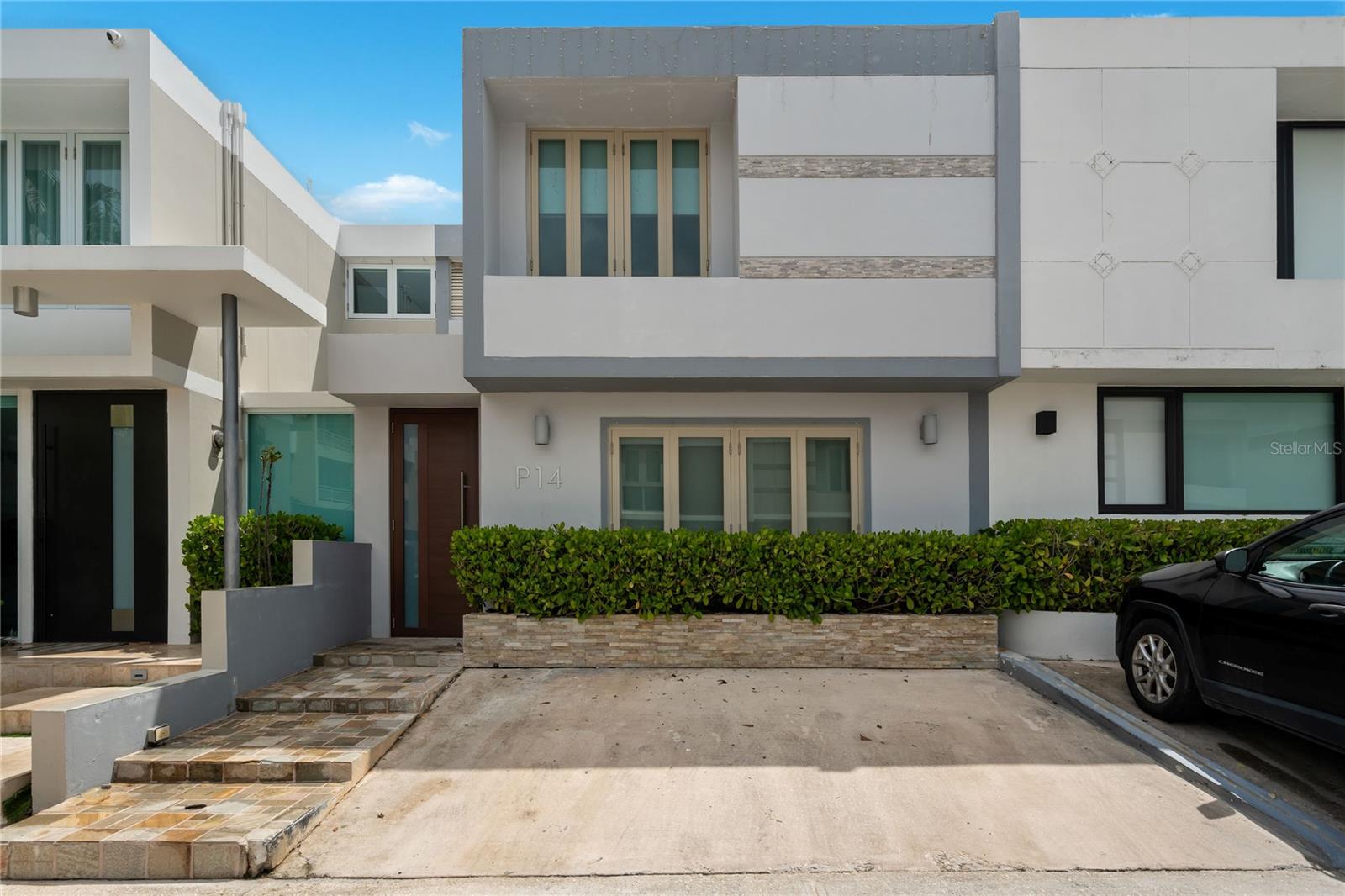 Location is everything! Nestled on a quiet cul-de-sac street in the gated neighborhood Prado Alto, this modern two-story townhouse has been completely remodeled with exquisite taste. It features approximately 2,000 sqft of living space, two bedrooms and a third room–that was converted to an office, and can easily turn back into your third bedroom–and 2.5 bathrooms. Filled with bright and open spaces that connect seamlessly throughout the living dining and all the way to the outdoor terrace. Some of the highlights include brand new floorings that automatically elevates the vibe of the property, a spacious open kitchen equipped with stainless steel appliances, and a master bedroom with spacious walk-in closet. Prado Alto’s location is top-notch and has 24/7 security. It is literally close to everything you need in Guaynabo City! HOA: $105/monthly.