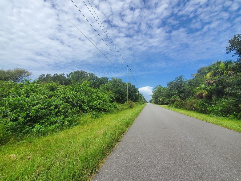 Photo of 15095 Gennaro Avenue, Port Charlotte, FL 33953 (MLS # C7463957)