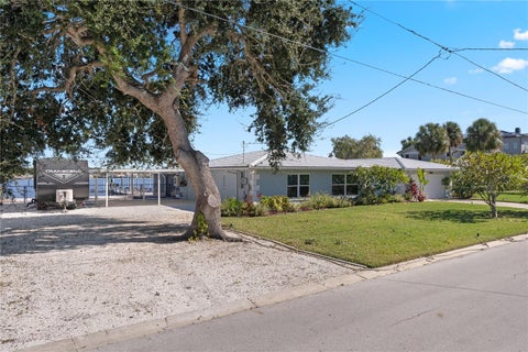 Photo of 5027 Waterside Drive, Port Richey, FL 34668 (MLS # TB8545095)