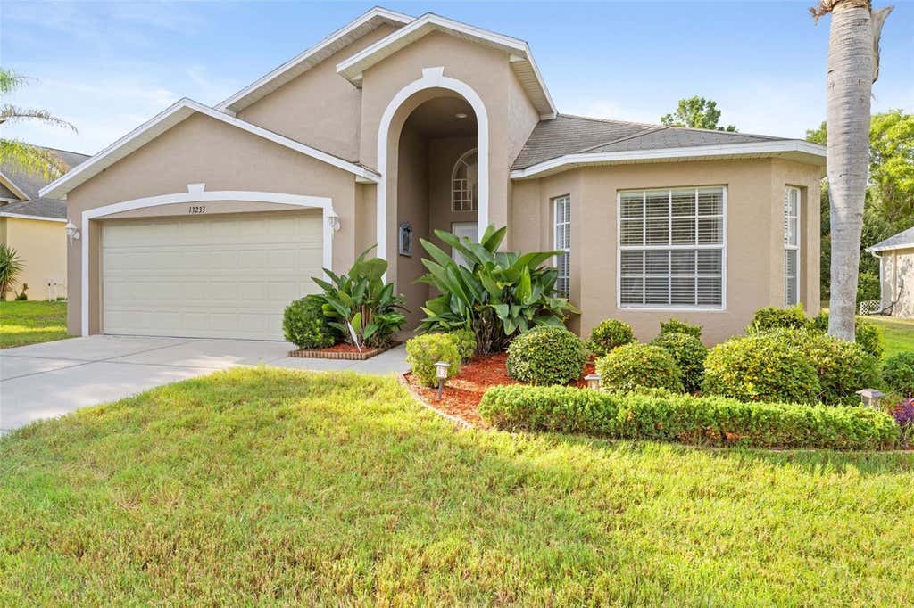 Photo of 13233 Bainbridge Way, Spring Hill, FL 34609 (MLS # TB8518982)