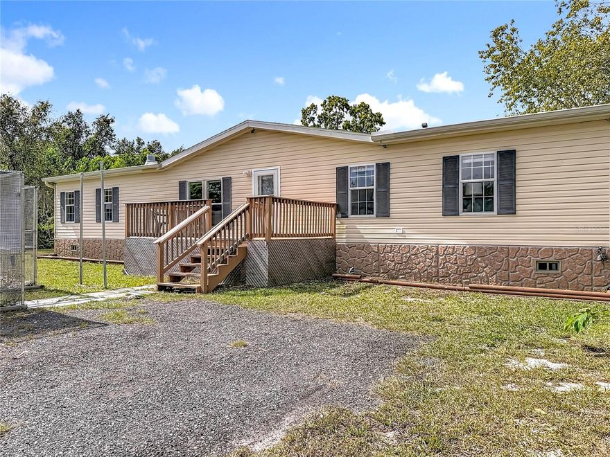 Must see this great deal! This spacious 3-bedroom, 2-bath, 2,040 sq. ft. home on 1.49 acres! Features include a split bedroom floor plan with fresh interior paint, brand-new carpet, a large living room, and an open kitchen. The master bedroom features an en-suite bath with a stand-up shower and a brand-new standalone tub. Exterior features include a huge fully fenced yard with an electronic front gate. This home was a former bird sanctuary for large birds such as Parrotts, Macaws and Tucans. The prior owner used the enclosure to house some of the birds. Centrally located just south of County Line Rd, with easy access to shopping, dining, schools, and more. This is a must see!