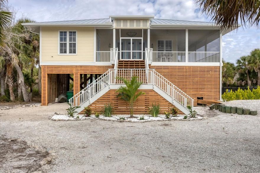 Experience island living at its finest on "Palm" Island, a magical barrier island on Florida’s West/Best Coast, just north of Boca Grande and south of Sarasota. Accessed by a quick car ferry ride, Palm Island offers an authentic Old Florida lifestyle with quiet, uncrowded beaches, peaceful days, and a true sense of escape from the everyday.

This inviting 3-bedroom, 2-bath coastal retreat is filled with natural light that beautifully highlights its relaxed island design. The open floor plan flows effortlessly, with living and dining spaces opening to a large screened lanai—perfect for indoor/outdoor living. Step outside to your private oasis overlooking a massive saltwater pool, built in 2022, featuring a generous sun shelf, in-pool stools, and ample space for entertaining family and friends.

Offered fully furnished, this home is truly move-in ready and equally ideal as a vacation rental or island getaway. Additional highlights include an oversized yard, new roof (2023), and blown-in insulation (2023), providing comfort and peace of mind.

Whether you’re seeking a full-time residence, seasonal escape, or investment opportunity, this Palm Island home delivers the charm, tranquility, and coastal lifestyle that make this island so special.