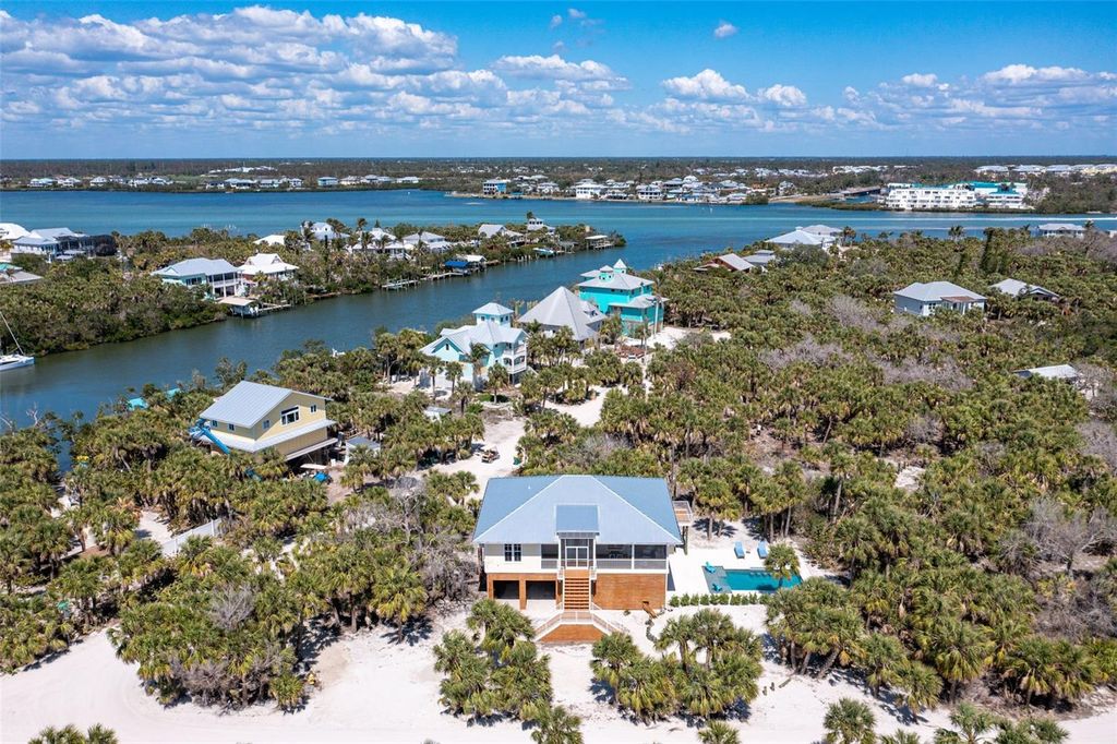 Photo of 32 Palm Drive, Placida, FL 33946 (MLS # D6145464)