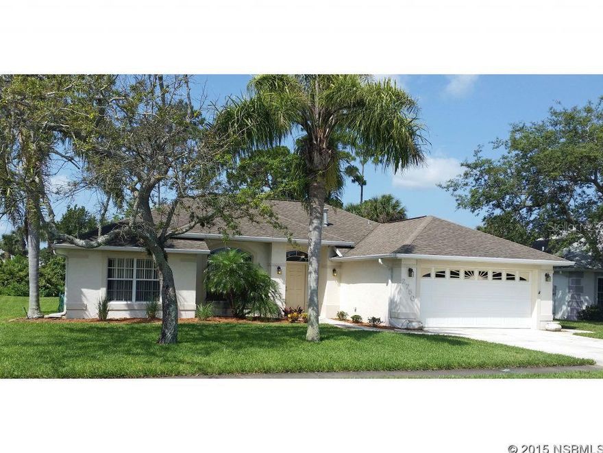 This well maintained Turnbull Bay home has gorgeous unobstructed lake views from the front and views of Turnbull Bay Golf Club's No. 12 par 3 from the back.  Recent updates include new SS appliances, central ac & gas heat, roof, int paint, carpet, tile and hardwood floors, cabinets & granite counter tops. This well designed true 3 BR / 2 BA is a  Must See!Dimensions are approximate. ;Water: City