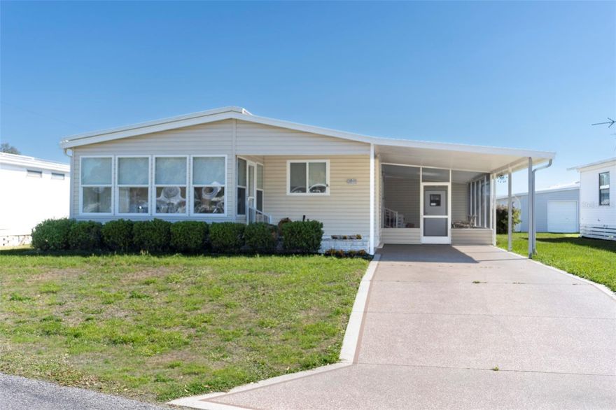 Beautifully maintained and thoughtfully updated 2BR/2BA home located in a serene area of the community, just moments from the golf course. This home features a covered, screened side lanai, perfect for relaxing or entertaining, as well as a golf cart garage and attached shed for additional storage.  Inside offers a functional open layout with laminate flooring in the kitchen and dining area, tile in both bathrooms, and Berber carpet in the living room and bedrooms. The spacious living area includes high ceilings, a ceiling fan, and flows seamlessly into the dining space.

The kitchen has been recently updated with brand new modern cabinetry, countertops, and backsplash (4/2025), along with newer appliances including the refrigerator, range, disposal and microwave (12/2023), plus a convenient breakfast bar.  The primary bedroom accommodates a king-size set and features a large walk-in closet, ceiling fan, and ensuite bath with step-in shower and tile flooring. The guest bedroom also includes a walk-in closet and ceiling fan, with a nearby updated guest bath (2024) offering tile flooring, a linen closet, and new shower.  Enjoy the 10x13 Florida room with double-pane windows, tile flooring, and ceiling fan, perfect for year-round use. Additional updates include a metal roof over (2022) and updated central HVAC (2022).  Community amenities include 27 holes of golf, 2 heated pools and hot tubs, 3 clubhouses, library, walking paths, game rooms, miniature golf, shuffleboard, tennis, pickleball, basketball, bocce, and more.  Schedule your showing today!