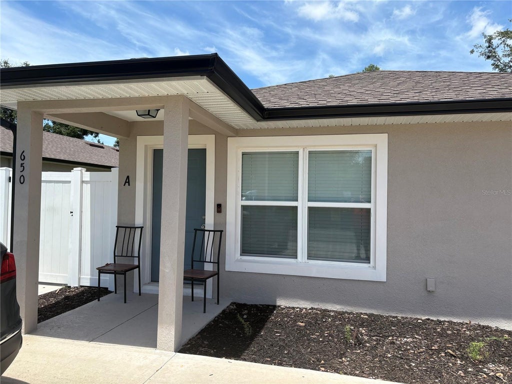 Photo of 650 E Grapefruit Avenue, Lake Alfred, FL 33850 (MLS # R4911947)